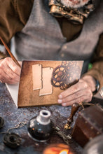 Load image into Gallery viewer, Libreta Steampunk con reloj y carteles