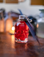Load image into Gallery viewer, Ambientador en frasco de poción de calavera