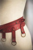 Cinturon Rojo de cuero con tiras y aros Circus
