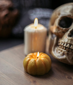Halloween pumpkin candle for rituals and witches